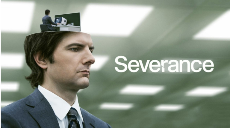 The actor Adam Scott sits in an office with a small version of himself sitting in a cubicle coming out the top of his head next to the word Severance.